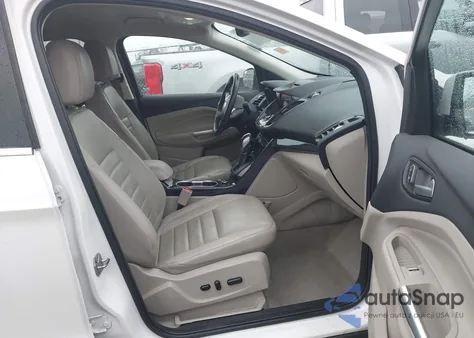 2016 Ford Escape Titanium z USA, uszkodzony, nr VIN 1FMCU9JX3GUC53779